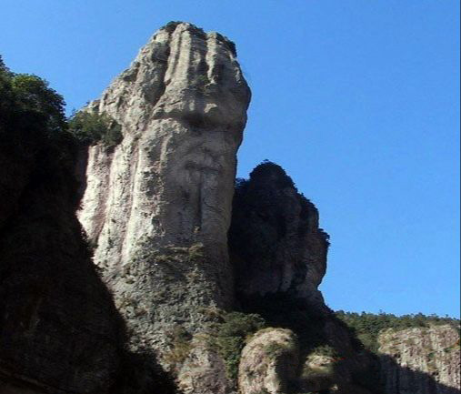 PS合成人脸山效果